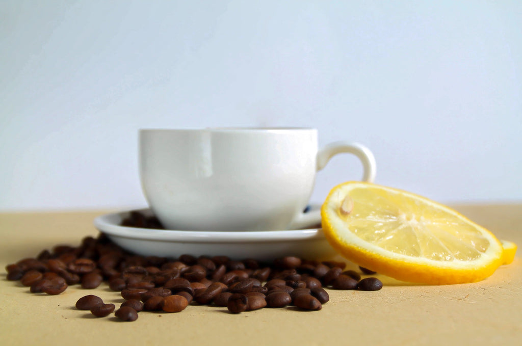 cup of coffee with lemon