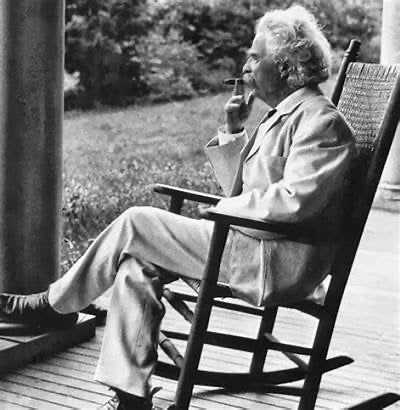 Mark Twain. pondering about what to drink next 